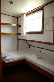 All cabins have an individual bathroom with sink, shower and toilet.