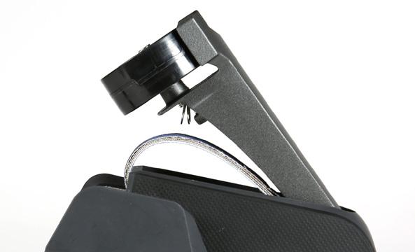 Push back on guide from the front of the sharpener until the guide snaps out of place. 2.