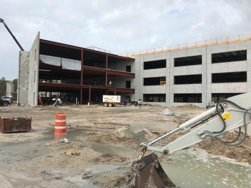 Building A (88,700 SF), connecting atrium (7,000 SF) and building C (97,200 SF) are being constructed first. The amenities building (15,000 SF) consists of a fitness center and spa.