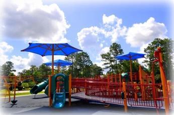 The park features typical playground equipment but with a design that accommodates those with special needs.