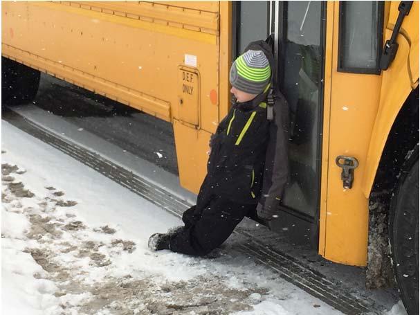 of a mile before the bus arrived at the next bus stop and the bus driver noticed the student was stuck in the service doors.