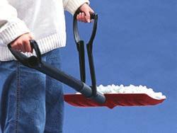 The shovel mechanism allows a person to lift snow and release it without bending. A simple twist of the wrist easily releases snow.