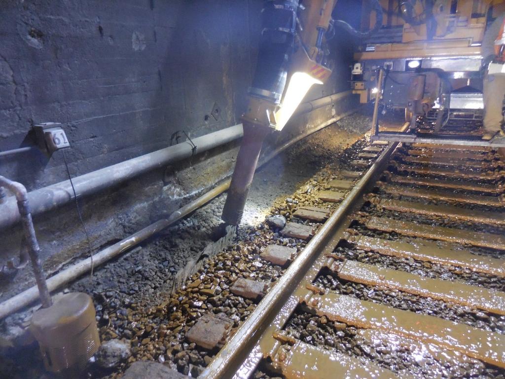 Figure 6 below shows the RailVac working to remove ballast along one of the tunnel walls.