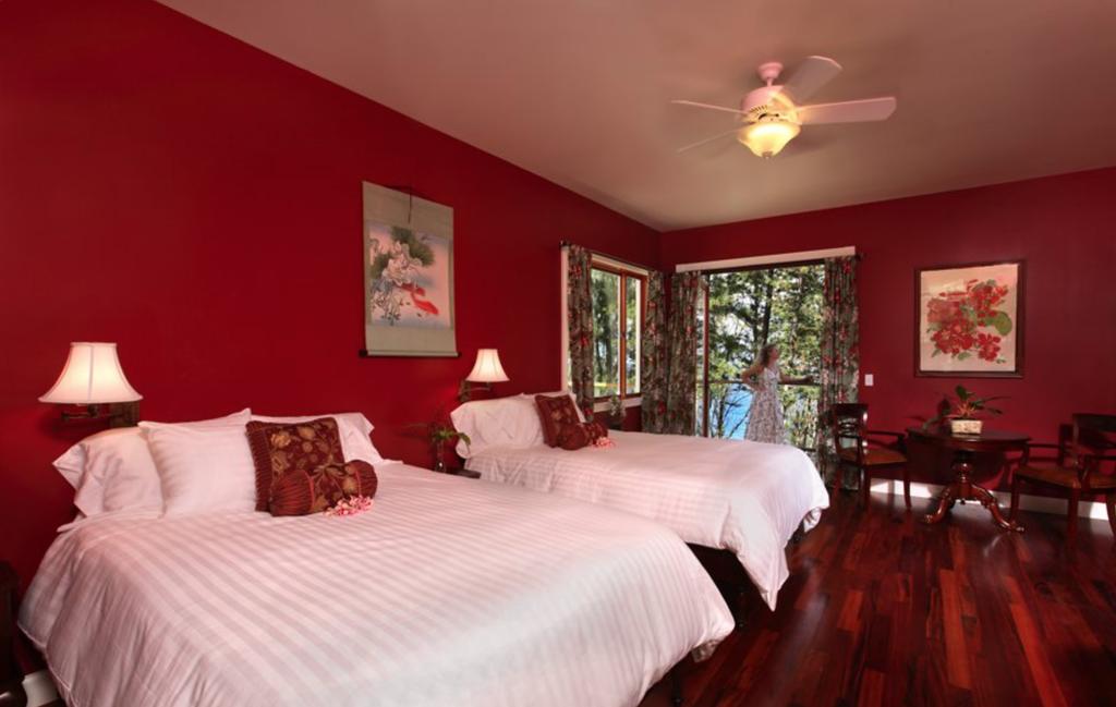 furniture, a spacious private bathroom with large soaking tub and separate shower, and