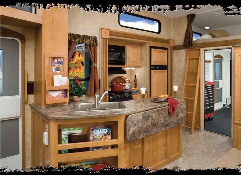 Raptor offers a loft with queen bed, entertainment center and storage cabinets.