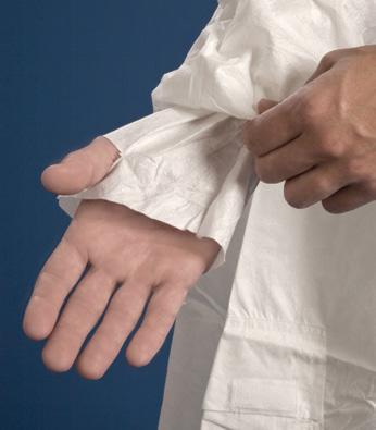 Double sleeve arrangement with inner sleeve thumbholes to facilitate dressing and eliminate cuff sealers (below center). Large cargo pocket on the thigh (below right). Reinforced crotch seam.