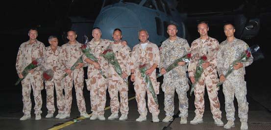 Pirmosios Oro pajėgų patarėjų grupės, rengusios specialistus Afganistano kariuomenės Oro korpuso Sraigtasparnių vienetui sutikimas Šiaulių aerodrome.