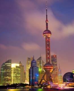 After dinner, the group will take a boat ride on the Huangpu River to enjoy the city lights at night.