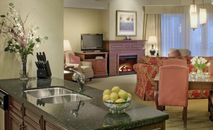 The Residences Full kitchens and dining room tables In-suite laundry 1