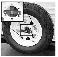 Place the tire on the carrier with the top lug bolt inserted into one of the holes in the tire rim and the bottom lug bolt in the center of the rim. 2. Install the top lug nut. Bumper Mount 3.