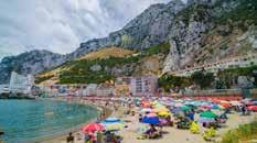 Catalan Bay is noted for its picturesque settings, its dramatic rocky slopes, fish restaurants and sheltered beach cove.