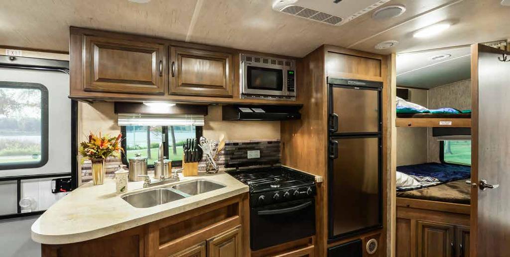 Model F242BDS The Fun Finder has all the upscale features of a much larger camper, smartly engineered into a lightweight package. The spacious kitchen affords style, convenience and best use of space.