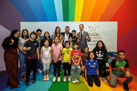 L-R: Children and youth beneficiaries from AWWA Family Service Centre and Singapore Fashion Runway got up close and personal with David Beckham and Marina Bay Sands President and CEO George