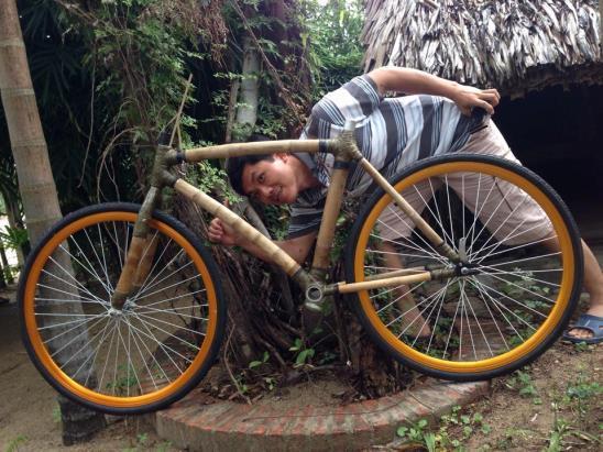 We borrow some of his bamboo bicycles and go for a ride around the quaint countryside