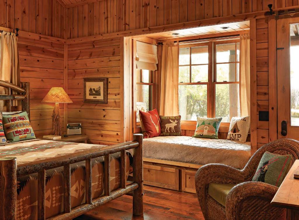ABOVE Each of the two bedrooms in the Alpha cabin has a comfortable window seat alcove for book reading or a sleeping child.