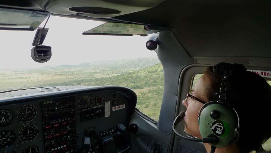 Figure 2. Megan Strauss on the way to conduct an aerial giraffe count in the Kirawira study area. The counting method is as follows.