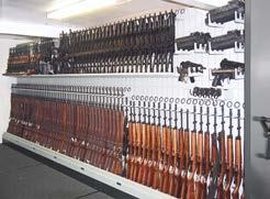 com DROP DOWN WEAPON SHELF (Patent Pending) Storage for up to 48 Carbines on a single