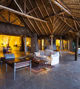 Constructed of local thatch and gunnite, the suites blend with the environment despite their commanding design.