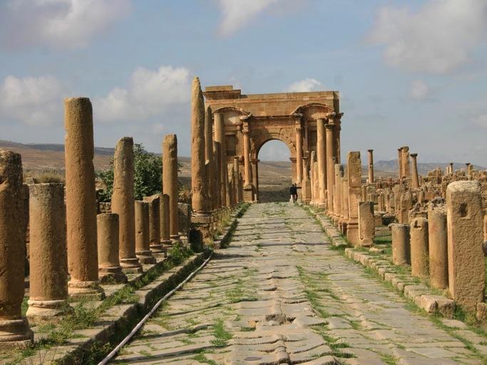 Tımgad One of the finest Roman sites in existence, the ruins of Timgad stretch almost as far as the eye can see over a plain that in winter is cold and desolate and in