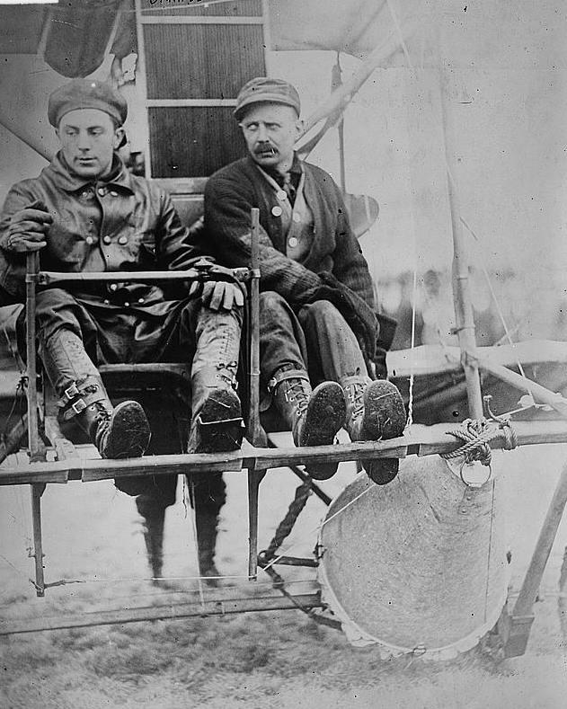 1912 Pilot Tony Janus (left) takes off with