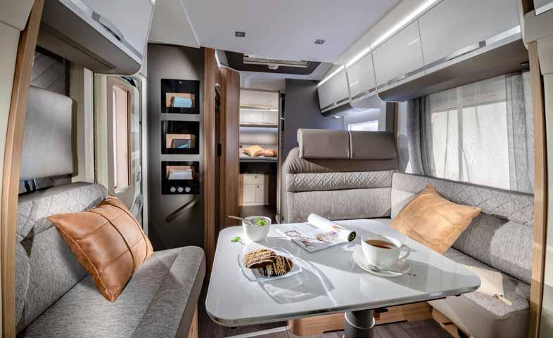 INTERIOR FEATURES I III V IV VI VII II I. Light-frame electrically operated front lift-down bed. II. Large dinette with Isofix and up-to 5 homologated seats. III. Panoramic and roof windows. IV. Contemporary interior design with choice of textiles and soft furnishings.