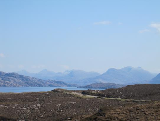 Then continue on the road and down the pass on a single-track narrow road round sharp hairpin bends. The views down the pass to Loch Kishorn in the distance are stunning, especially on a sunny day.