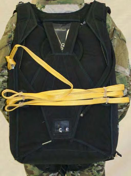 1.2. Military Javelin (MJ) Harness/Container Nomenclature Left Main Riser Cover Right Main Riser Cover Reserve Pin Cover Flap Reserve Pilot Chute Cap Staticline Clip Staticline Left Main Side Flap