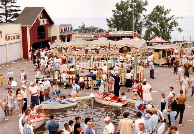 c. 1960 Sunday in the Park This view of the north end shows prior locations of the Boats and Turtles.