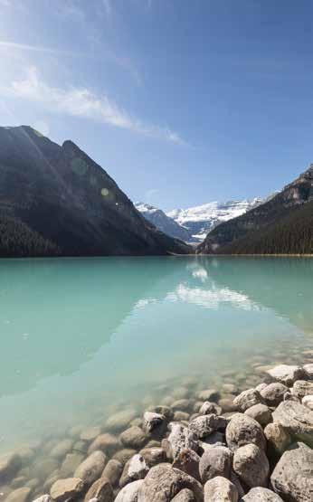 Immerse yourself in nature and hike around the quiet waters of Lake Louise, taking in the famous Victoria Glacier.