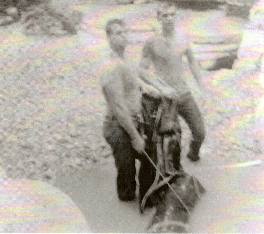 Outside Hill Creek Cave near Mt. View, June 1957 Umpy Osborn and Don Meek with the four-man Raft we used to explore Blanchard Springs L/R T. L. and Joe K.