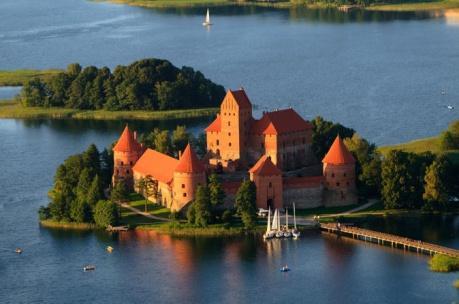 The old town of Trakai, which includes the Island and the Peninsula Castles, surrounded by lakes, is one of the most impressive and most