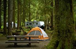 Campgrounds have running water and bathrooms and have areas to set up tents or hook-up a recreational vehicle.