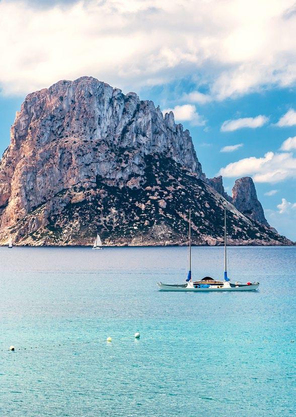 IBIZA Expect to be greeted by stunning white beaches lined with hidden coves on your approach to the iconic island of Ibiza.