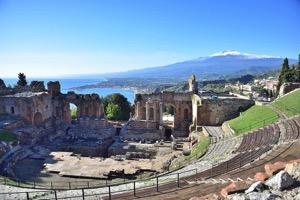 Day 7 Taormina Many will claim that Taormina is Sicily s most beautiful town, with Etna rising in the background and the town perched very high up above the turquoise sea.