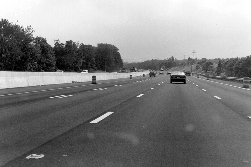 Pavement marking in the concurrent lane section of I-66 consists of a double dashed white stripe (see Figure 18.) Figure 18.