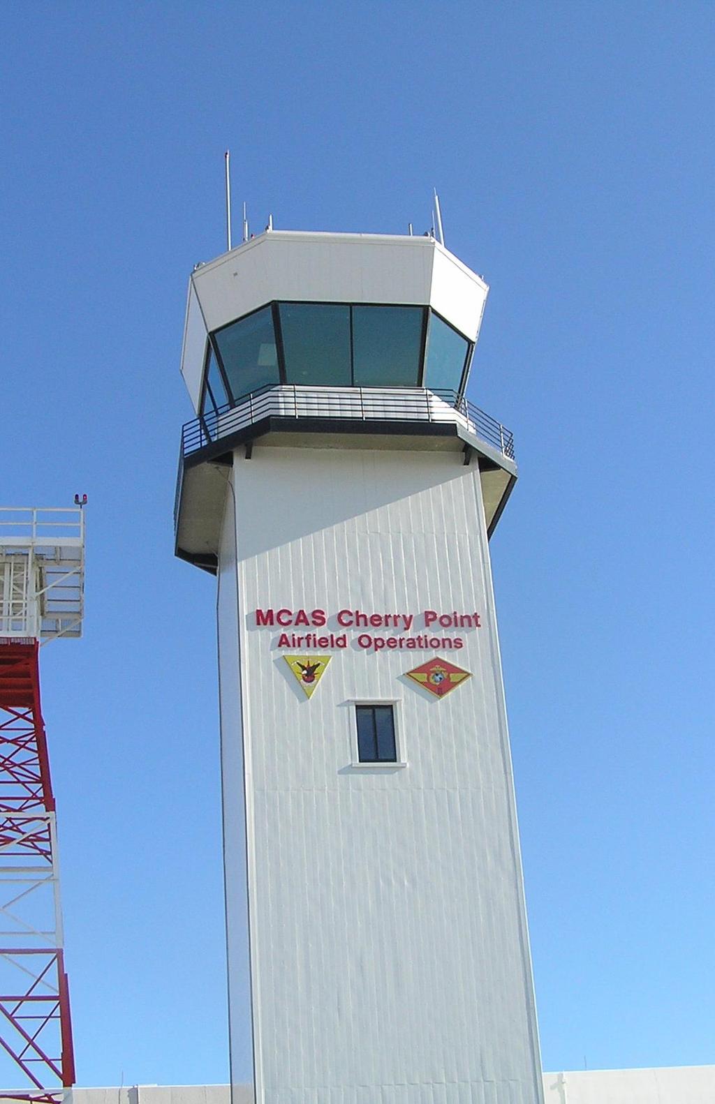Control Tower Facility that uses air/ground communications, visual signals and other devices