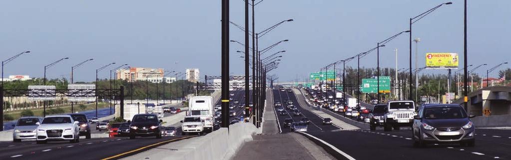 Concrete barriers are used to separate the reversible express lanes along I-595 from the general use lanes. 2.
