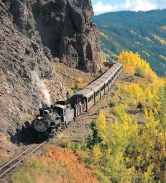 gauge railroad, the Cumbres & Toltec. The scenic journey unfolds as soon as the train, pulled by its powerful locomotive, leaves the Chama, New Mexico station.