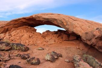 Once you encounter slick rock, stay on it along the highest points to reach Sunset Arch. From Sunset Arch you can see Sunrise Arch (aka Moonrise Arch) which is located further south about 1,000 feet.