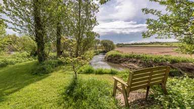 Secluded countryside setting Peaceful and quiet Follow the River Bride into the village Abundance of wildlife and flowers Riverside and Woodland walks 25 minute walk from Burton Beach 3.