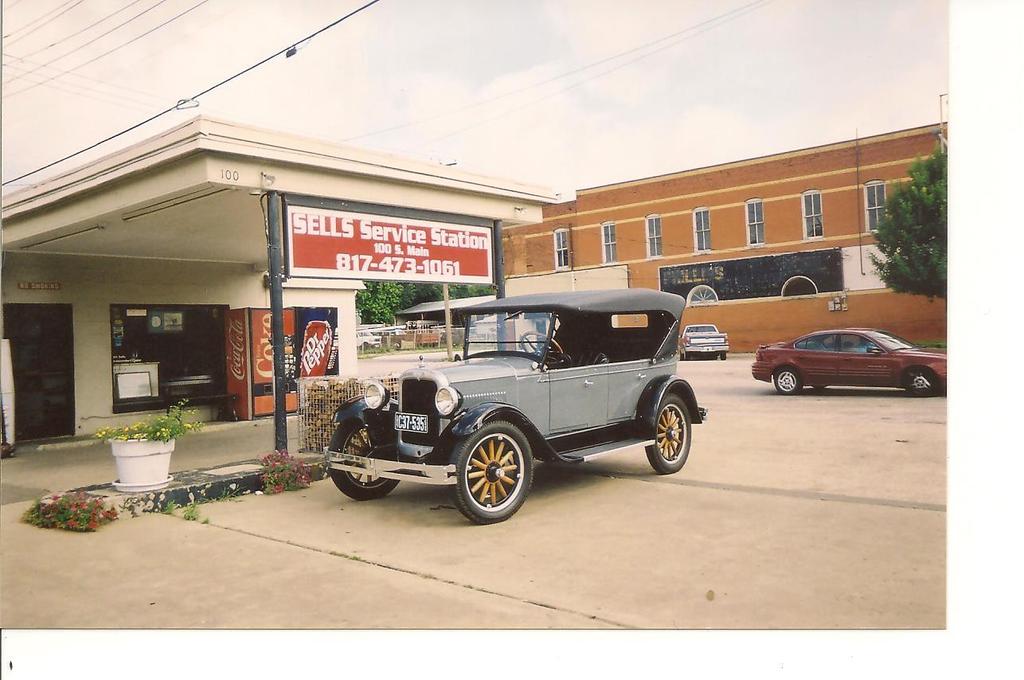 After restoration, at the original owners garage. Photo by Judy Perrine Over a period of time we have restored it to what it is today.