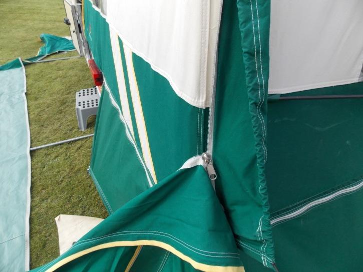 (3) Attach Awning Zip To Camper Lift the protective flap, which protects the zip on the main camper canvas.