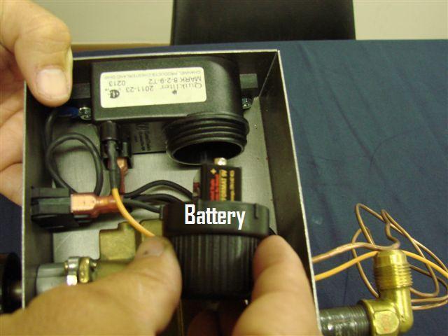 Installing / Changing Batteries to Spark Igniter Unit in Valve Box: 1) Carefully unscrew the spark igniter unit cap. 2) Remove cap with battery as shown in FIG. 3.