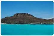 PM: Chinese hat This is a small islet (1 sq km) located just off the southeastern tip of Santiago Island. It is a recent volcanic cone, shaped like a Chinese hat when seen from north side.
