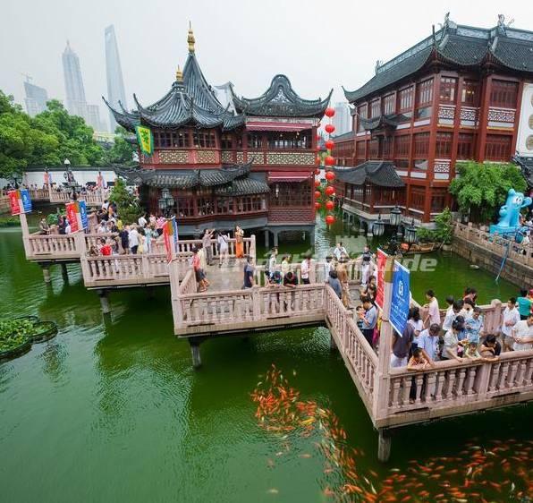 It abuts the Yuyuan Tourist Mart and is accessible from the Shanghai Metro Line 10 Yuyuan Garden Station. The Bund: A waterfront area in central Shanghai.