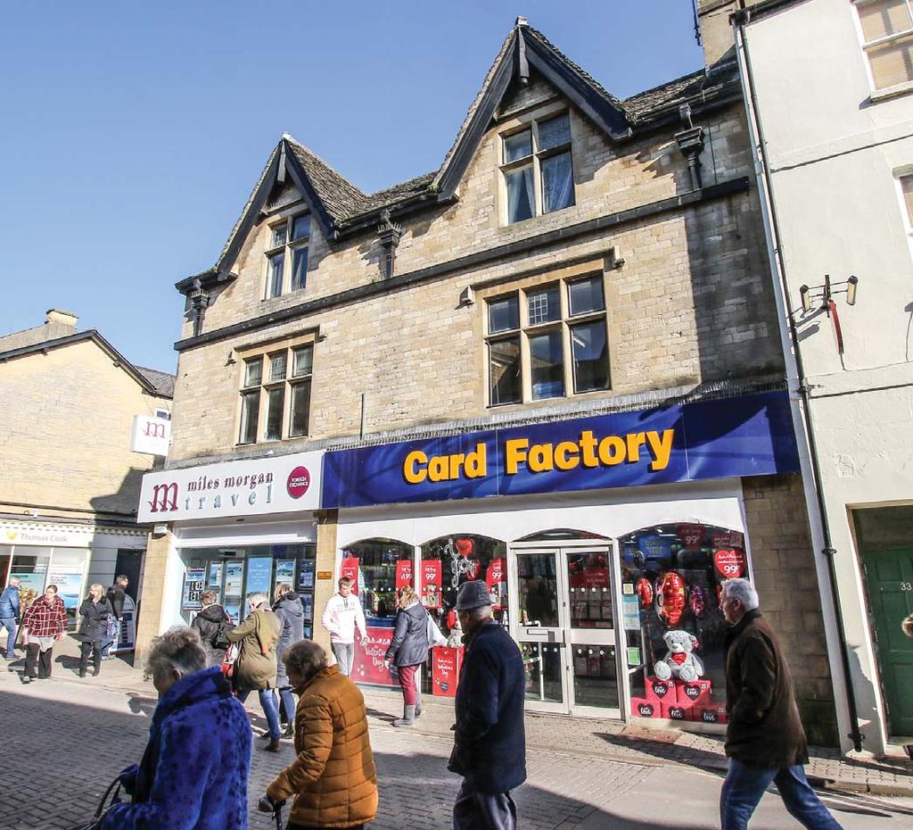 IVESME SUMMY ﬀluent market town in the heart of the Cotswolds hree well configured retail units with two self-contained 1 and 2 bed S s at second floor etail units let to Ladbrokes, Card Factory and