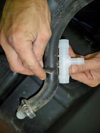 (Fig. 6) Cut ¾ vent line hose approximately 4 ½ inches from elbow end of hose. (Fig. 7) Install the Vacuum Vent Assembly as shown.