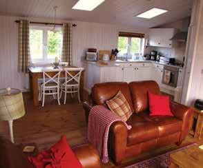 HAZEL The large open plan living area has plentiful space for dining and relaxing with beautiful furnishings and memorable style to make this a lodge to visit again