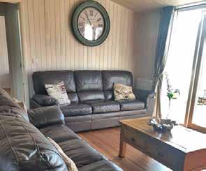 This spacious lodge is furnished with beautiful solid oak furniture and many fantastic iconic