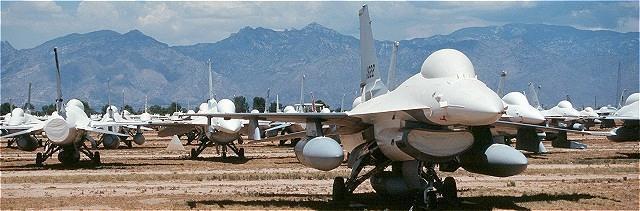 covers placed over aircraft stored in the boneyard in